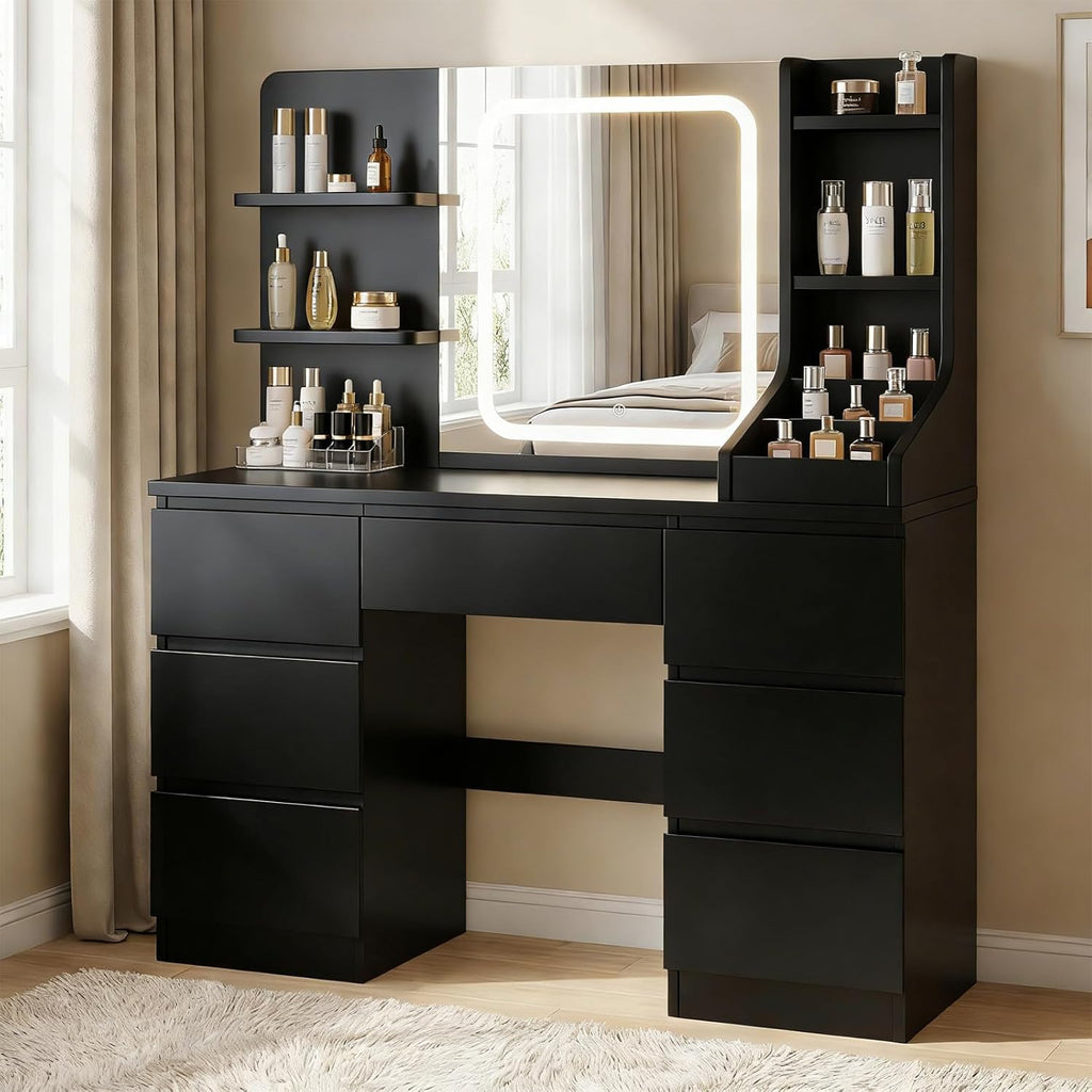 TRIUMPHKEY Tocador con iluminación LED, brillo ajustable, mesa de maquillaje con espejo, tocador moderno con 7 cajones, 4 estantes y 3 compartimentos abiertos para el dormitorio (Negro)