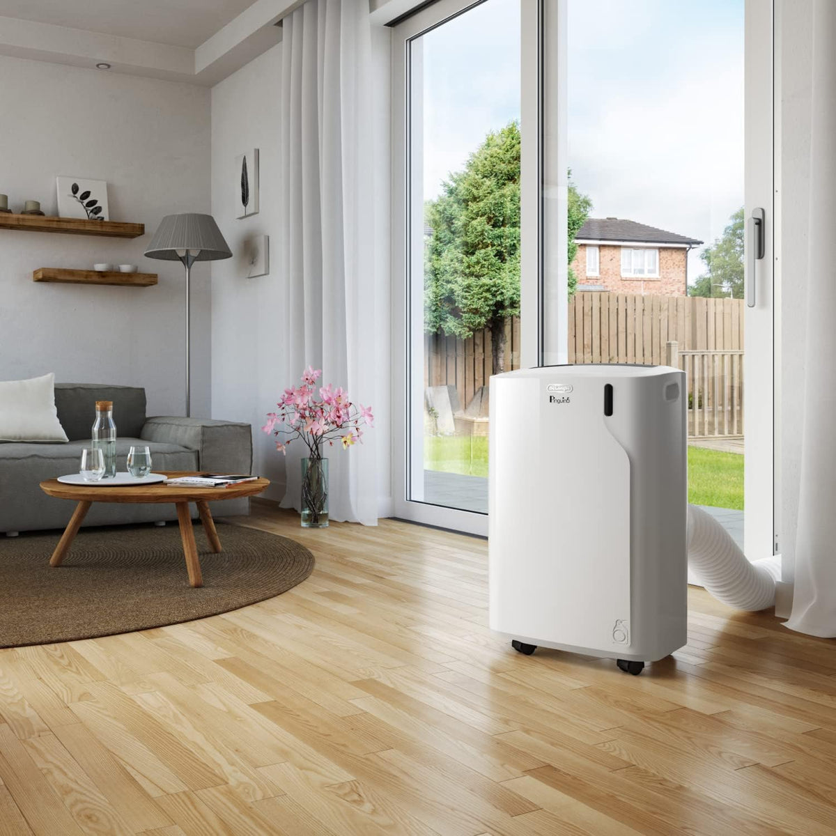 De'Longhi Pinguino - Aire acondicionado portátil 3 en 1, para habitaciones de hasta 27 m², con deshumidificador y ventilador, 9400 BTU, funcionamiento silencioso, mando a distancia, temporizador de 24 h, clase de eficiencia energética A (PACEM82)