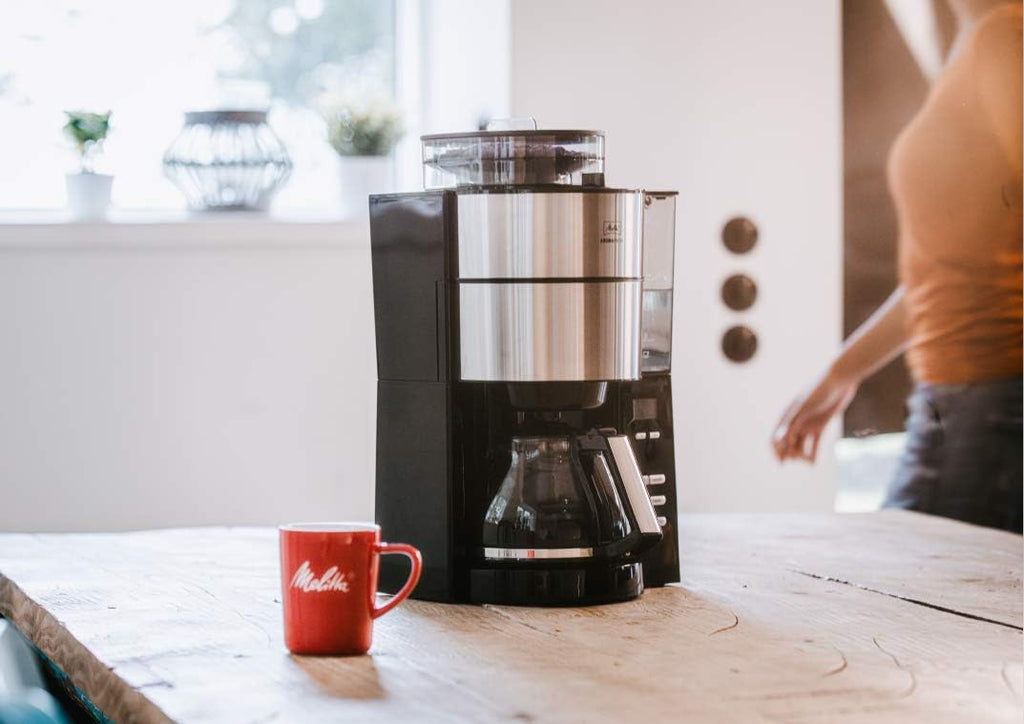 Melitta AromaFresh - Cafetera de filtro - con jarra de cristal - molinillo integrado - función de temporizador - 10 tazas - Negro puro
